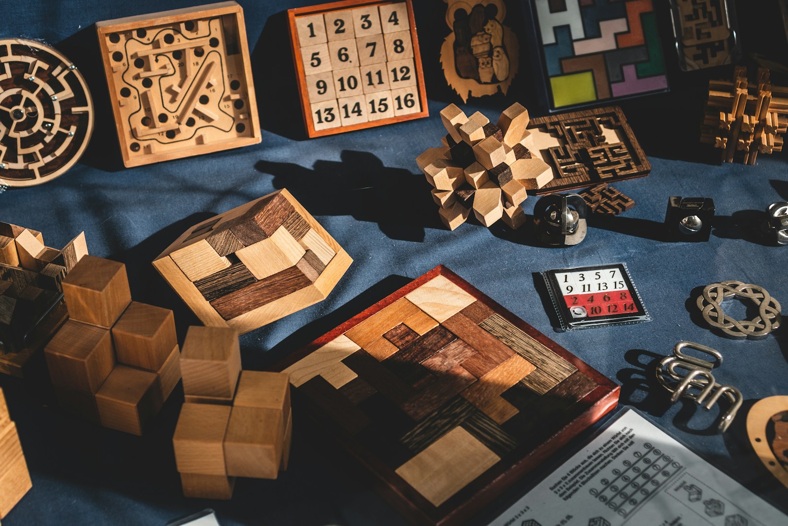 brown wooden blocks on blue textile